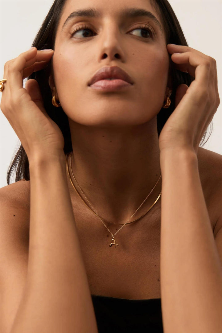 Curly Molten Mini Initial Necklace Gold