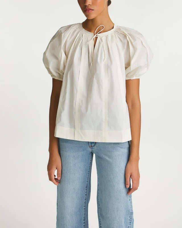 Ioli - versatile shops elastic blouse with holes