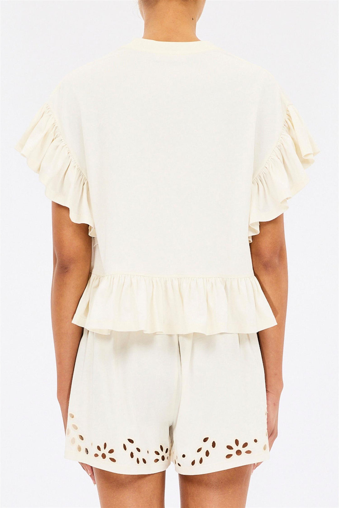 Mariana Peplum Top Cowire